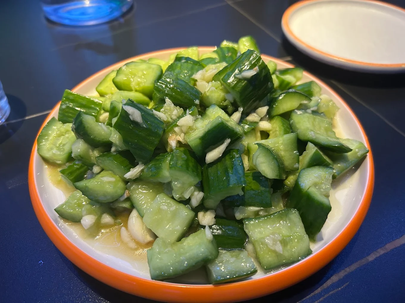 Garlic-infused cucumber salad at Xinjiang BBQ, a Barbecue Restaurant in San Diego