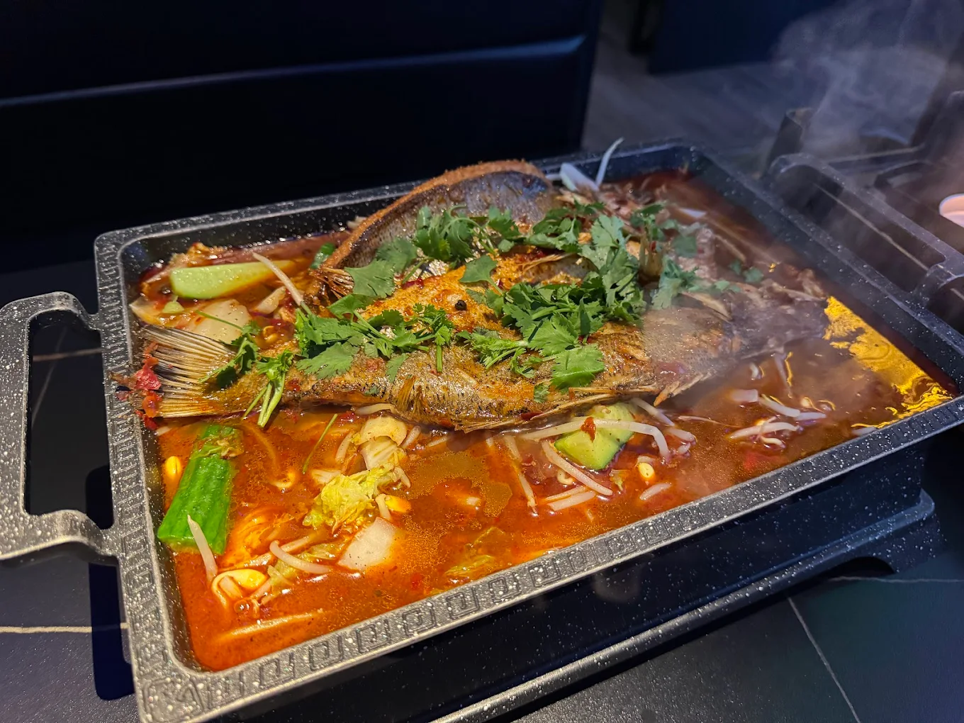 Spicy braised fish with veggies at Xinjiang BBQ, a Barbecue Restaurant in San Diego
